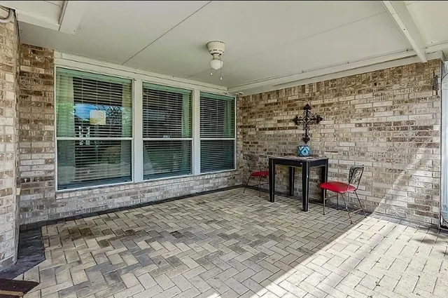 a living room with a couch and a table