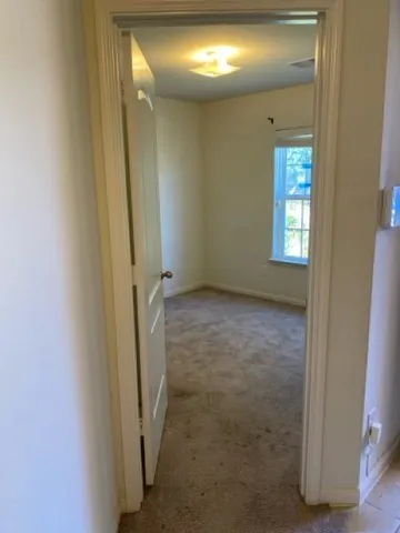 a view of hallway with shower