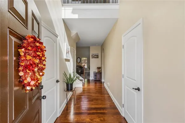 a view of entryway with wooden floor