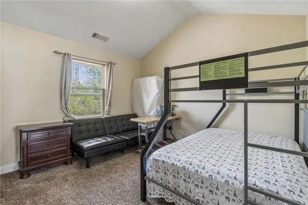a view of livingroom with furniture and window