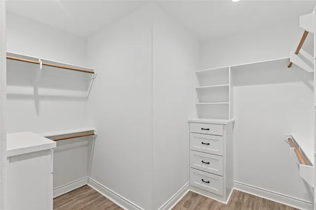 a view of an empty walk in closet