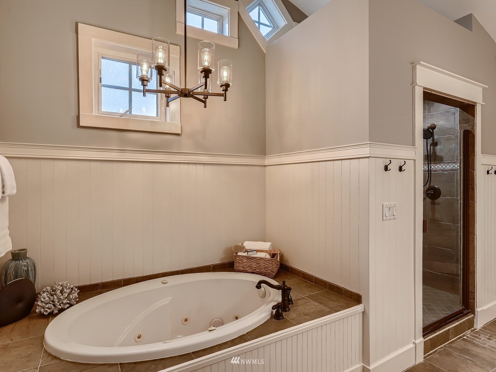 706 North 29th Street Renton, WA 98056 - Photo 20 of 37 a bathroom with a tub and a shower