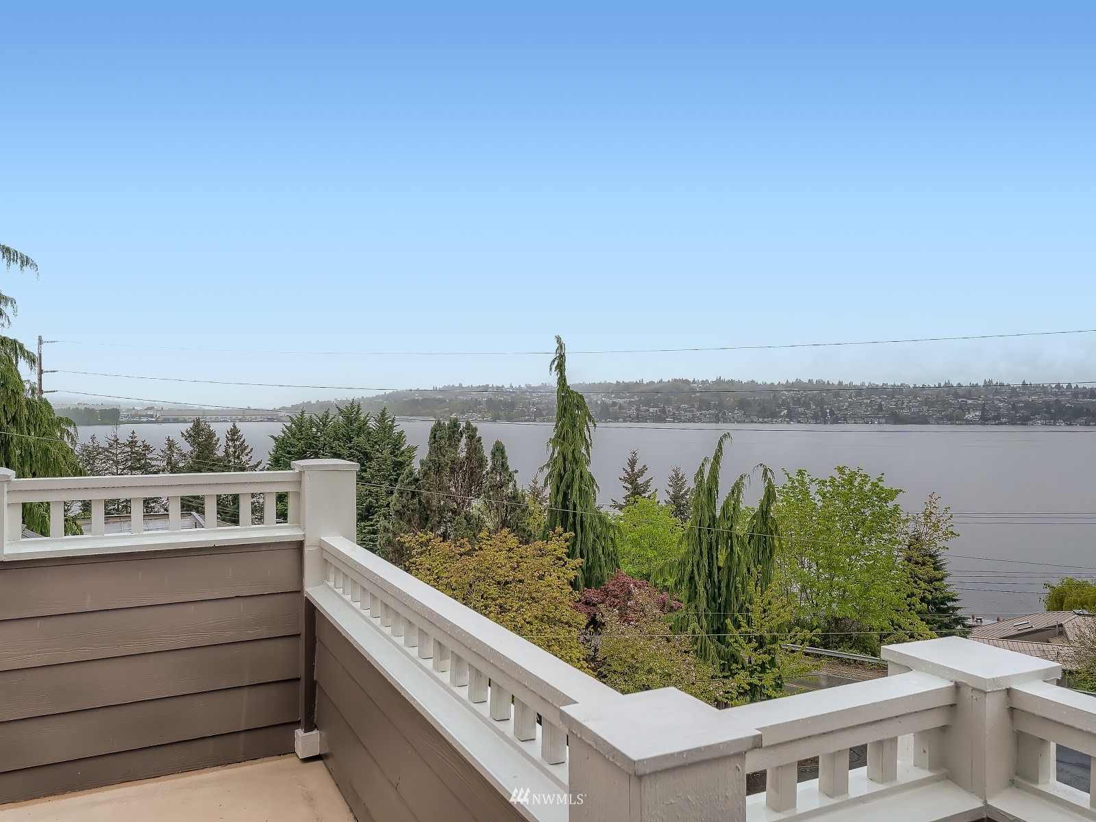 706 North 29th Street Renton, WA 98056 - Photo 22 of 37 a view of a city from a balcony with outdoor seating