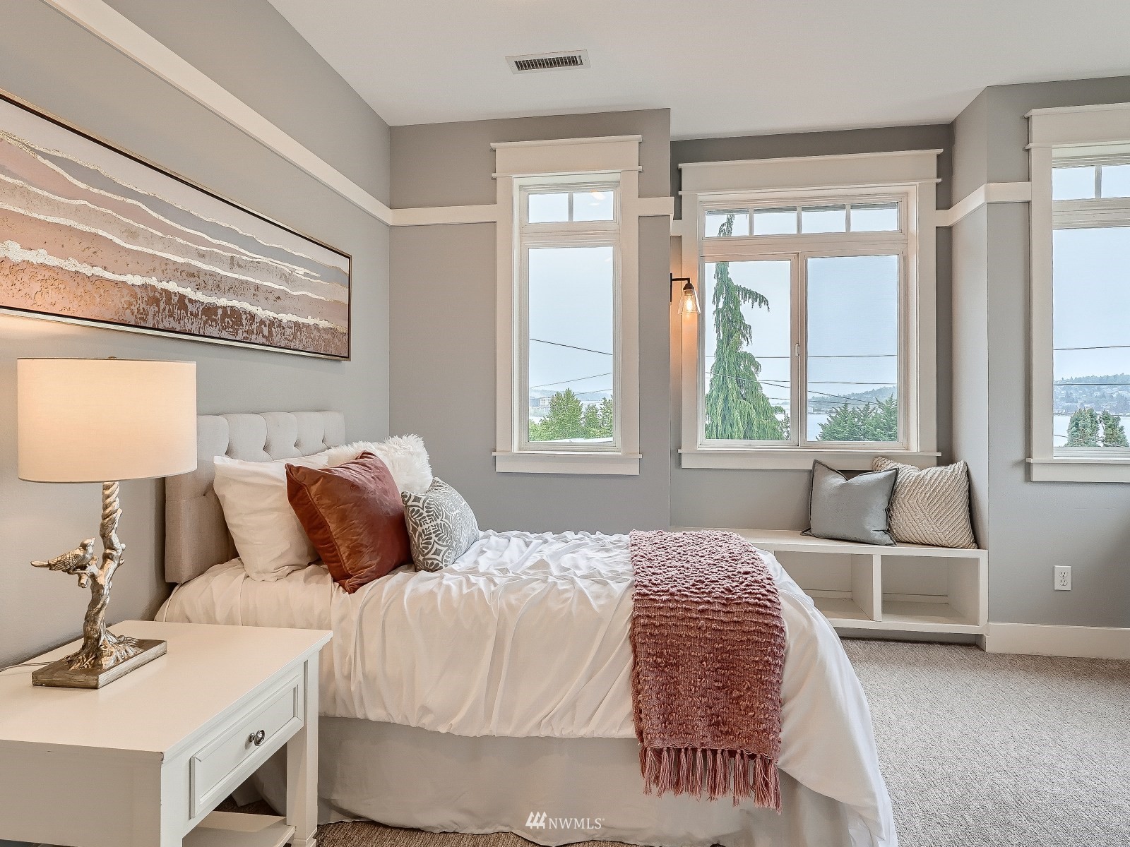 706 North 29th Street Renton, WA 98056 - Photo 26 of 37 a bedroom with a bed and wooden floor