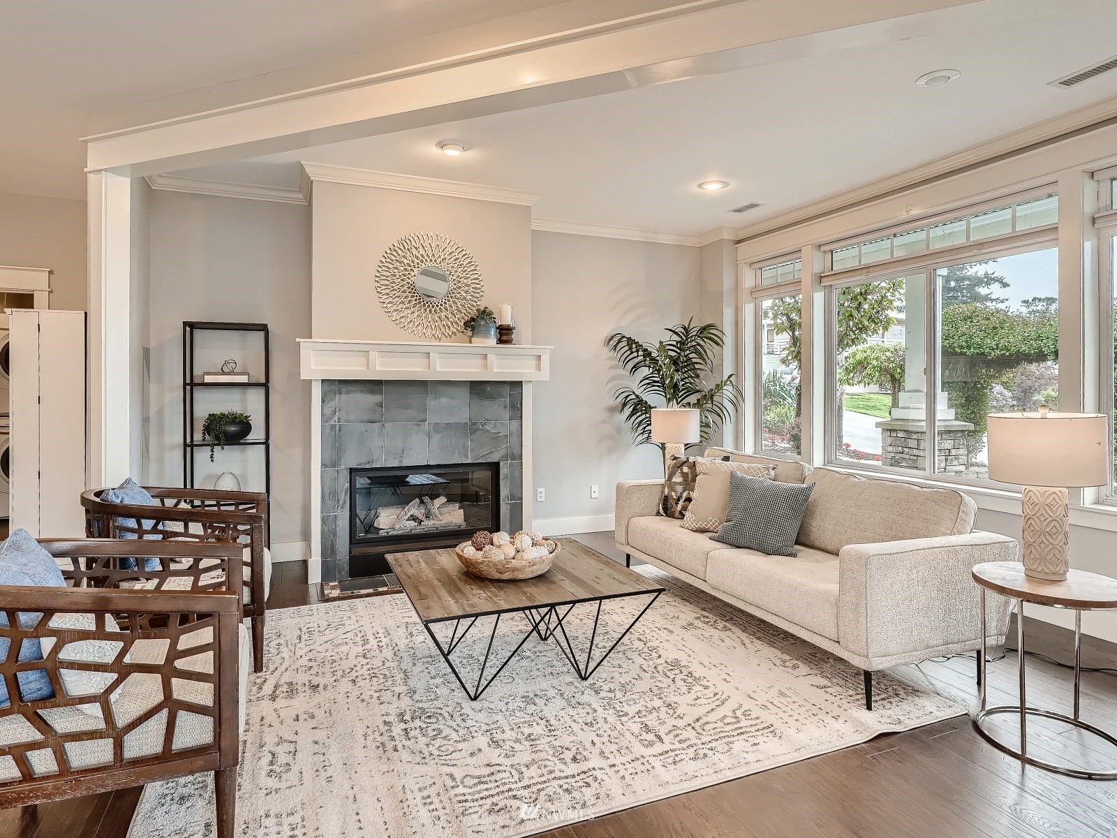 706 North 29th Street Renton, WA 98056 - Photo 29 of 37 a living room with furniture and a fireplace