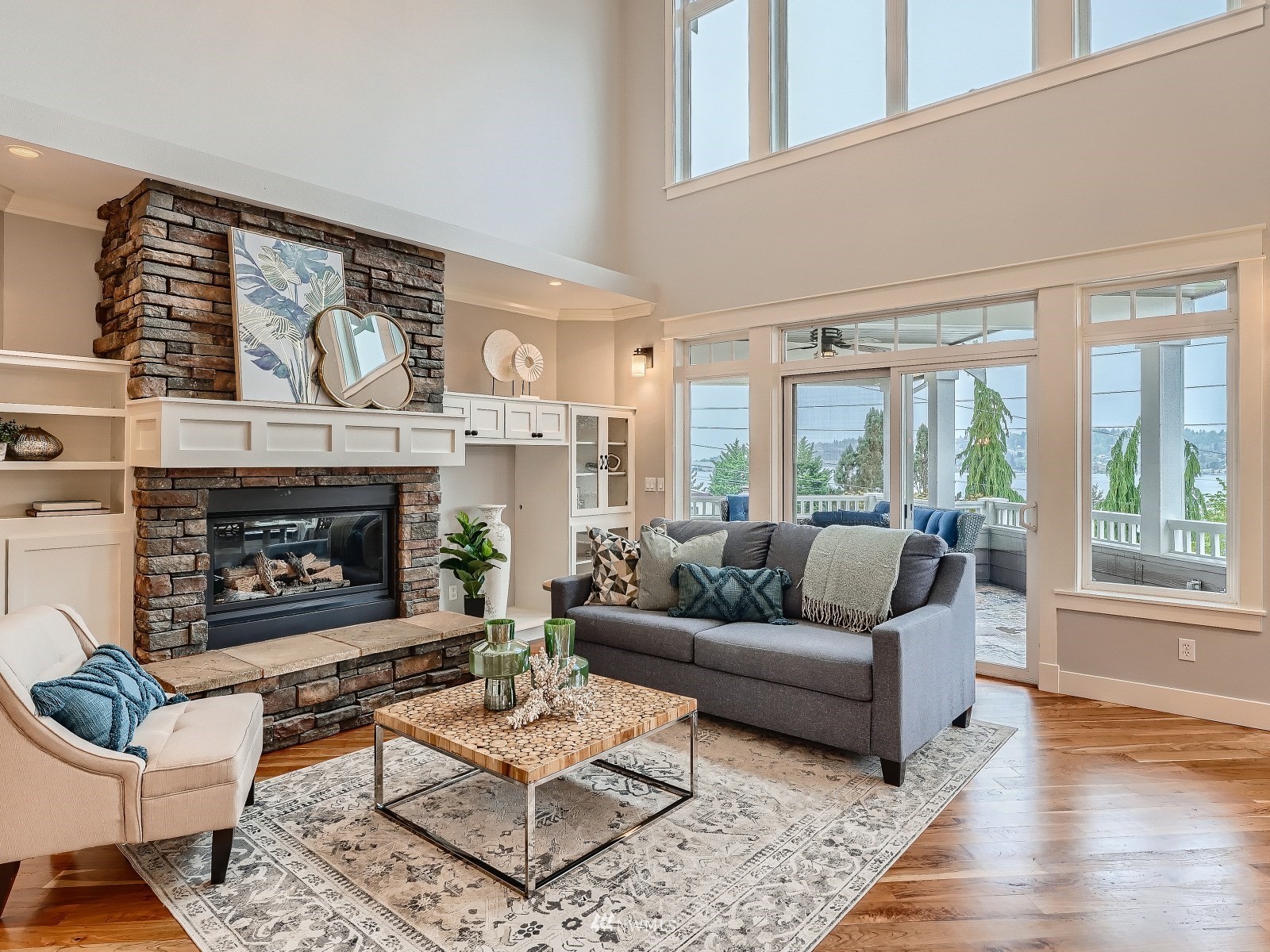 706 North 29th Street Renton, WA 98056 - Photo 4 of 37 a living room with furniture a large window and a fireplace