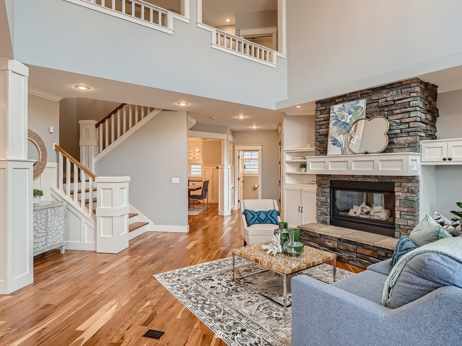 706 North 29th Street Renton, WA 98056 - Photo 5 of 37 a living room with furniture and a fireplace
