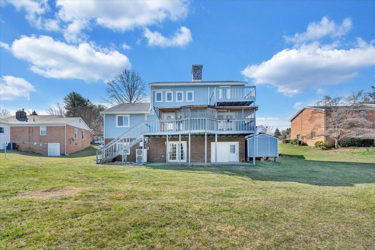 465 Summit Ridge Road Southwest Christiansburg, VA 24073 - Photo 66 of 79 a view of a house with a big yard and a large tree