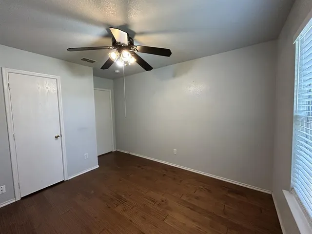 a view of a backyard with a garden