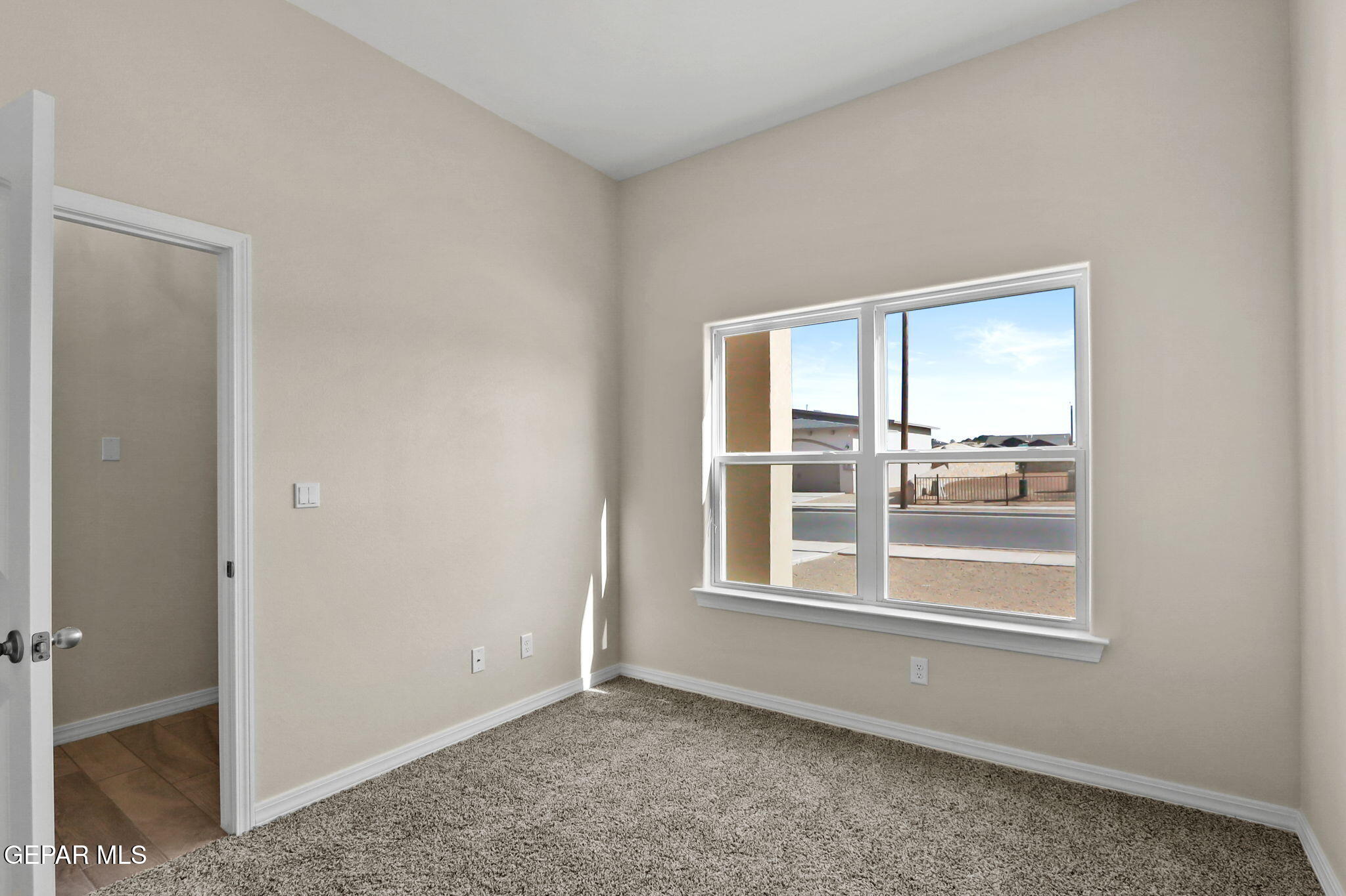 7417 Rio Rimac Drive El Paso, TX 79934 - Photo 24 of 39 a view of an empty room with a window