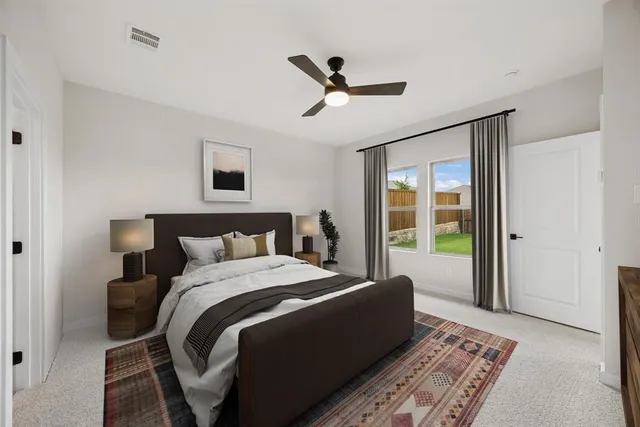 a bed room with a bed and a couch