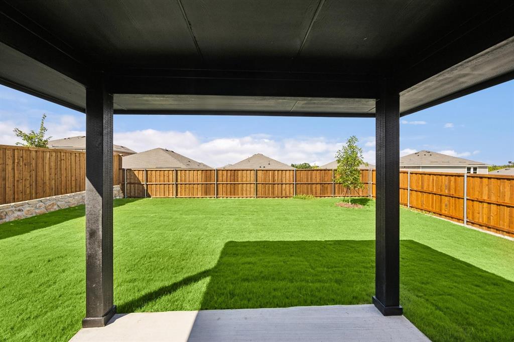 1317 Richardson Street Howe, TX 75459 - Photo 21 of 24 a view of a porch and garden