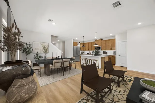 a view of a dining room with furniture