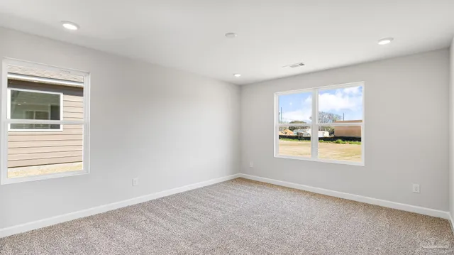 a view of an empty room and window