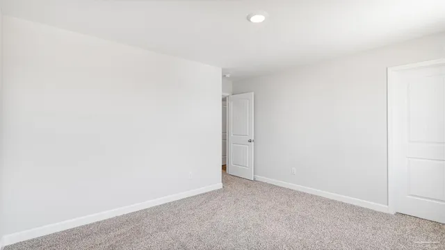 a view of swimming pool with seating space