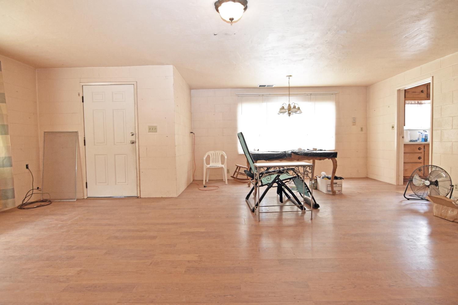 1206 South Verduga Road Turlock, CA 95380 - Photo 7 of 36 a view of a room with furniture and wooden floor