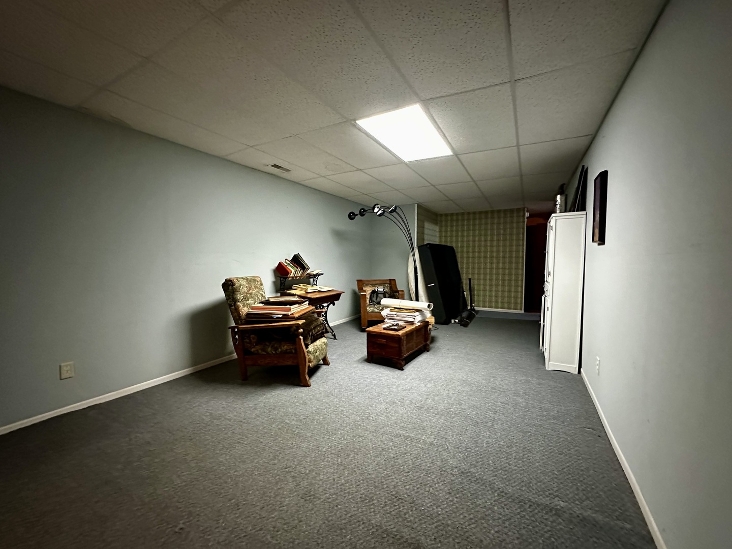 6119 Little Galilee Road Clinton, IL 61727 - Photo 15 of 26 a living room with furniture and a chandelier