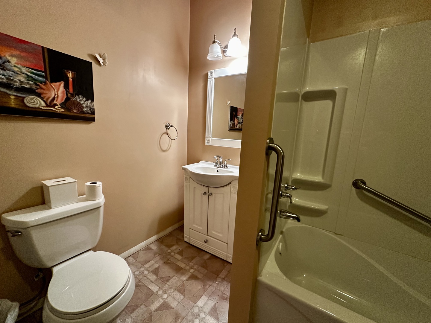 6119 Little Galilee Road Clinton, IL 61727 - Photo 18 of 26 a bathroom with a toilet sink and mirror