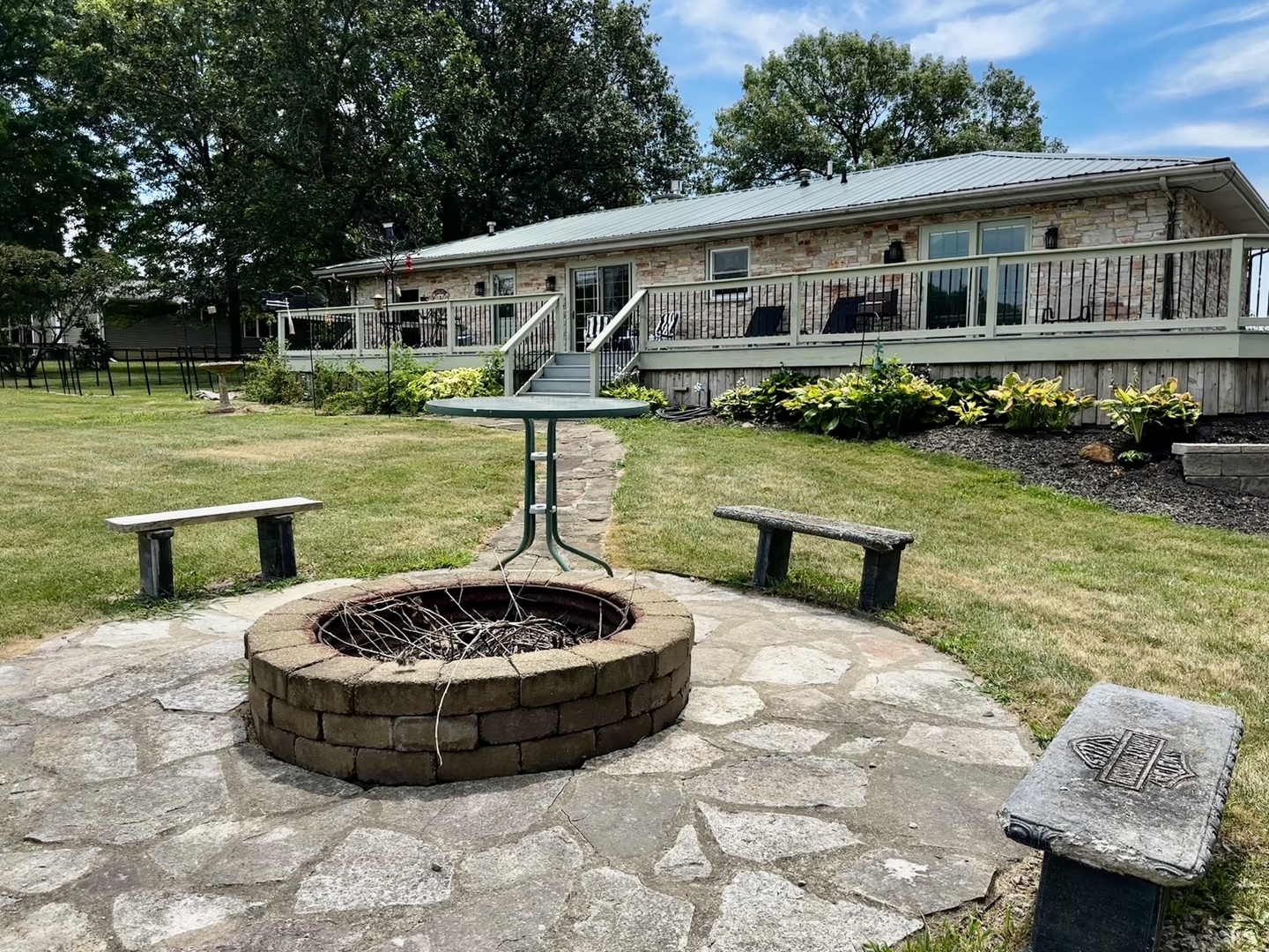 6119 Little Galilee Road Clinton, IL 61727 - Photo 20 of 26 a view of a house with pool fire pit and chairs