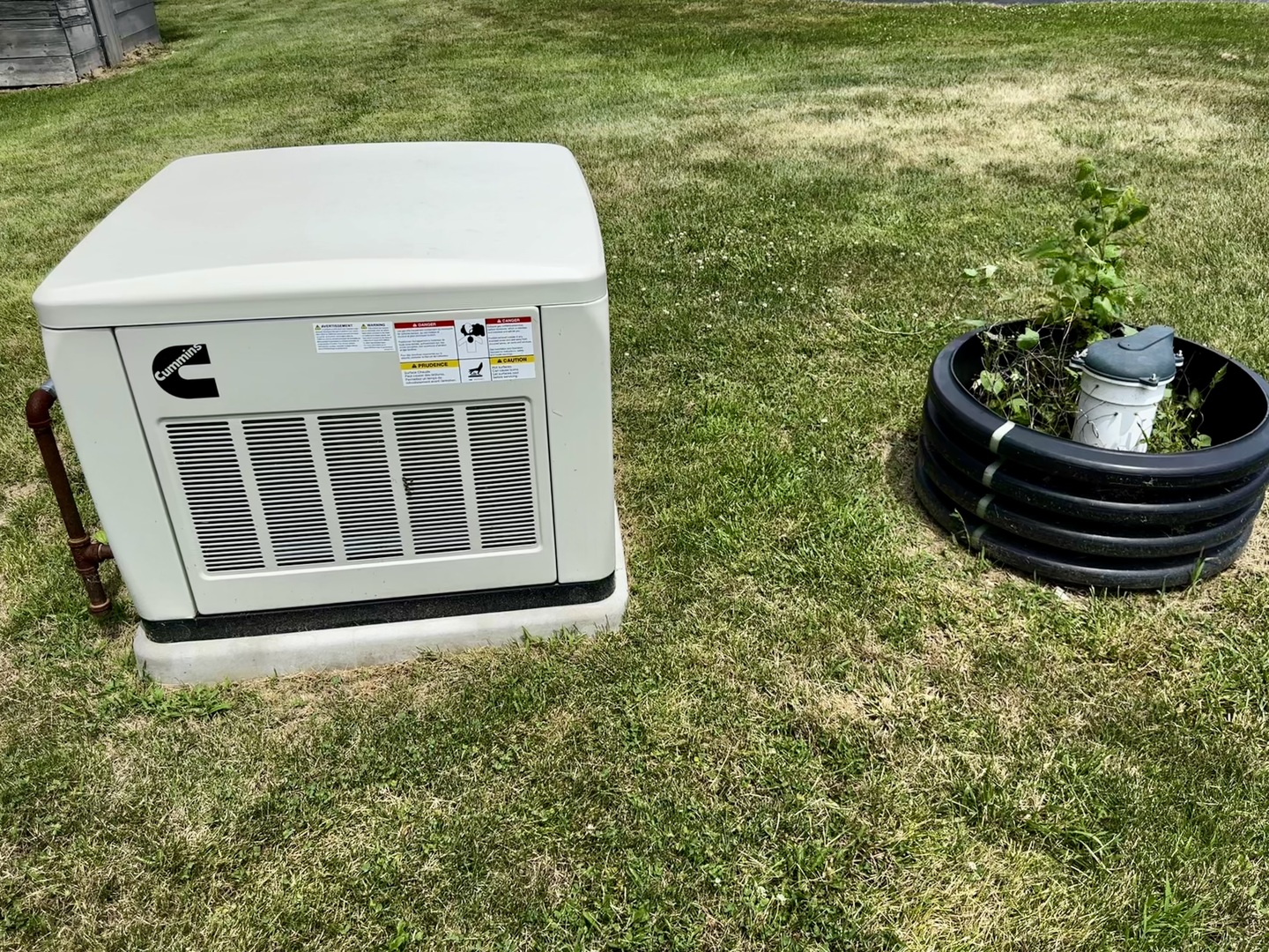 6119 Little Galilee Road Clinton, IL 61727 - Photo 23 of 26 a view of a backyard with plants and white tub