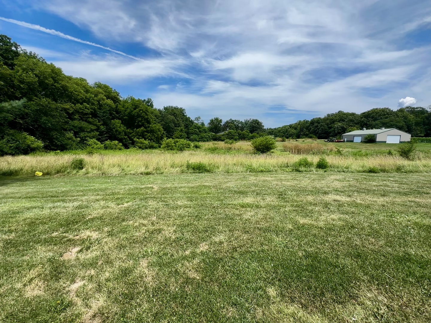6119 Little Galilee Road Clinton, IL 61727 - Photo 24 of 26 a view of a field with an ocean