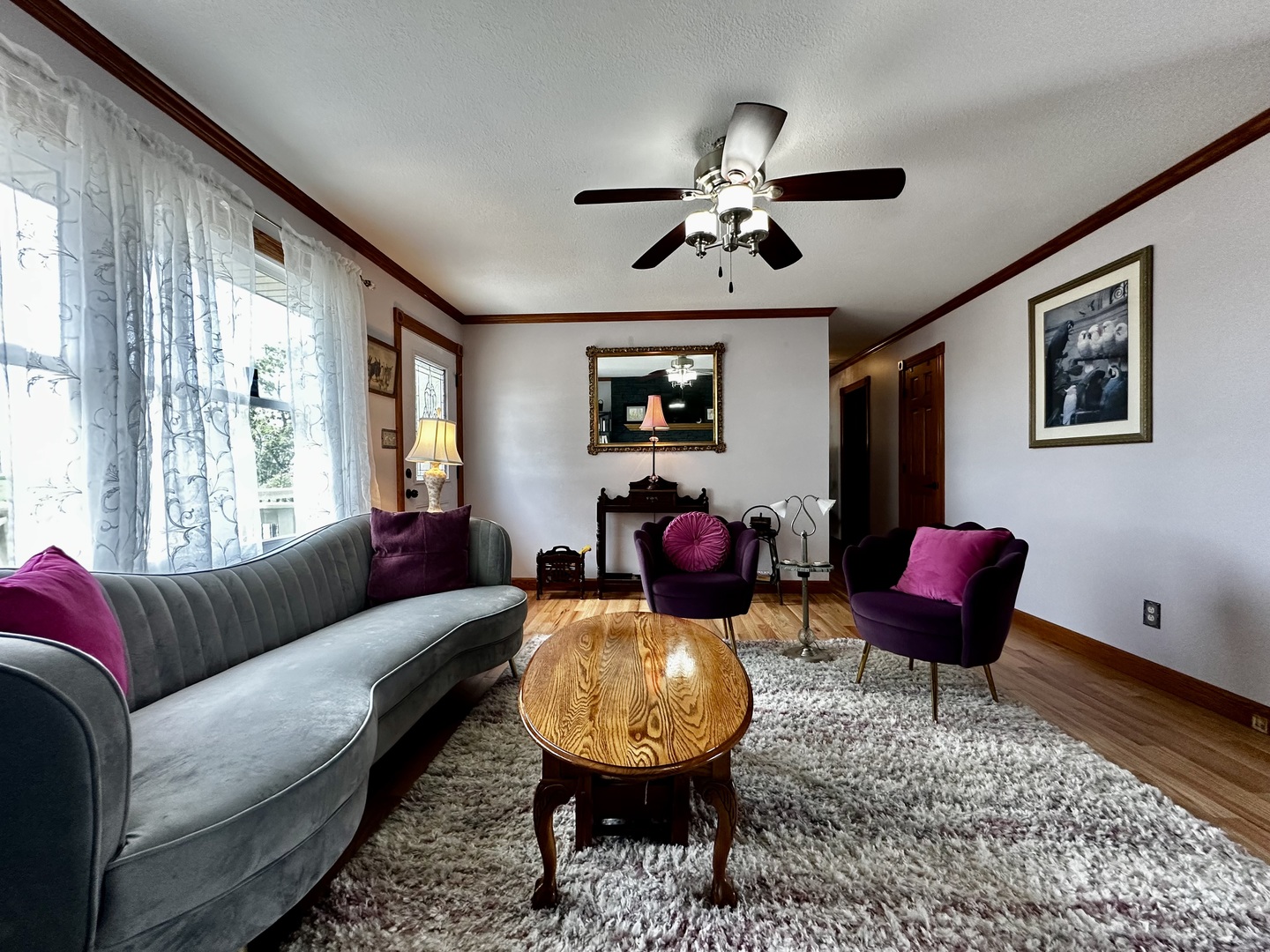 6119 Little Galilee Road Clinton, IL 61727 - Photo 6 of 26 a living room with furniture a rug and a large window