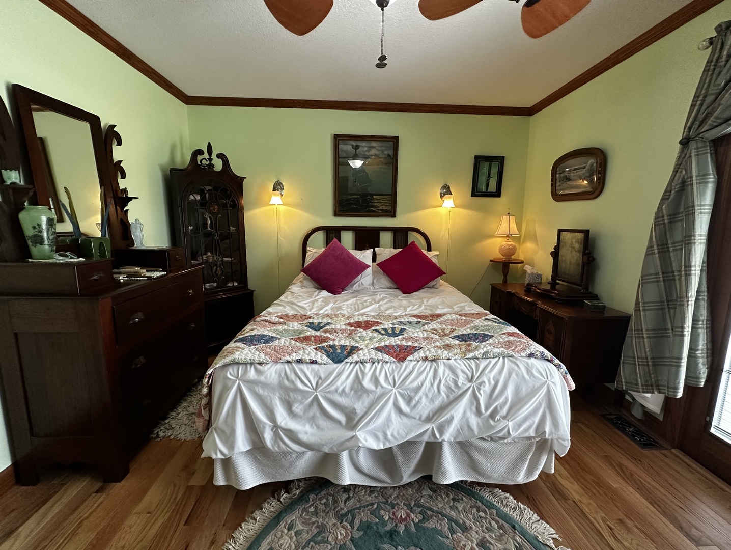 6119 Little Galilee Road Clinton, IL 61727 - Photo 9 of 26 a bedroom with a bed and a flat tv screen on dresser