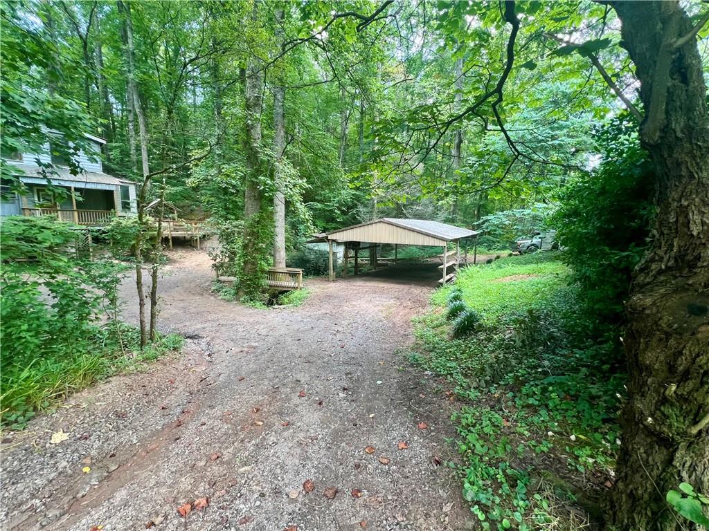 579 Banner Circle Ellijay, GA 30540 - Photo 2 of 13 a view of a house with large trees
