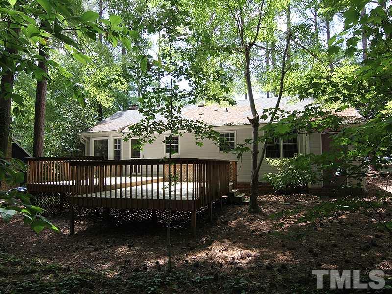 6416 Wynbrook Way Raleigh, NC 27612 - Photo 12 of 13 a view of a house with a yard
