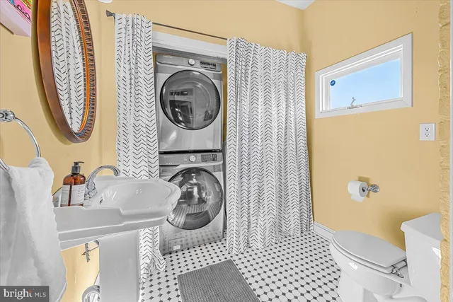 a bathroom with a sink and a toilet