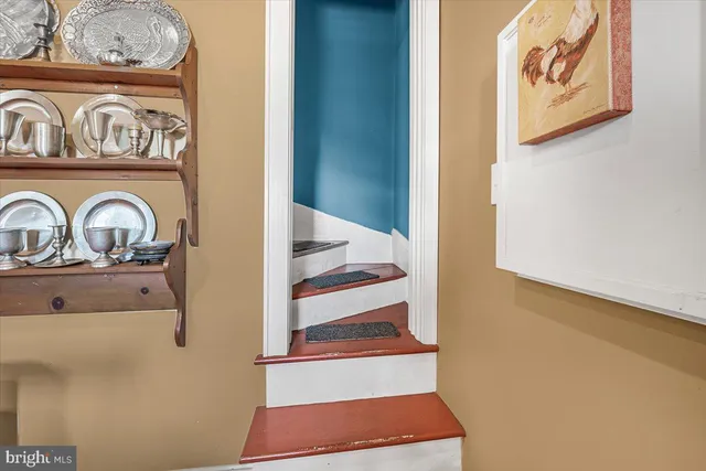 a view of a door and a window