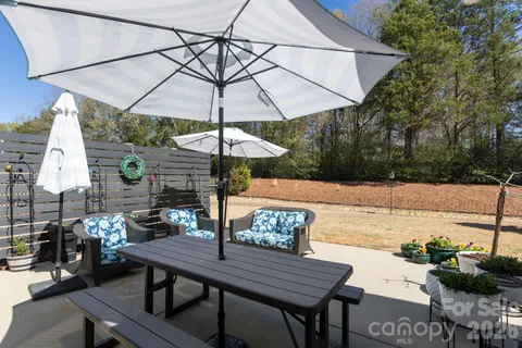 a view of a terrace with sitting area