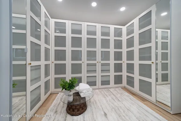 a bed room with furniture and a window