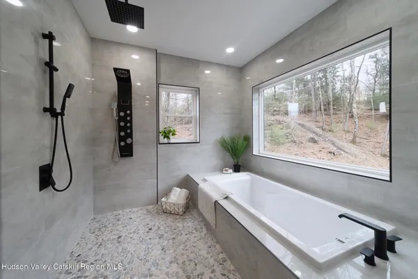 a bathroom with a toilet sink and vanity