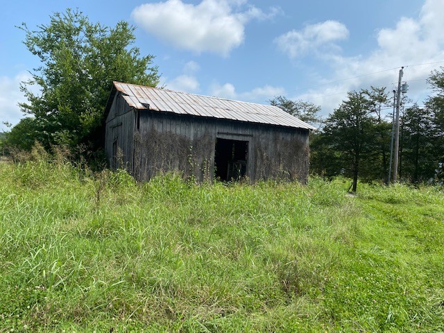 0 Marble Hill Road Winchester, TN 37398 - Photo 2 of 4 a backyard of a house with lots of green space