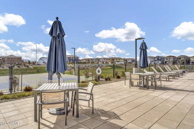 a view of a terrace with furniture