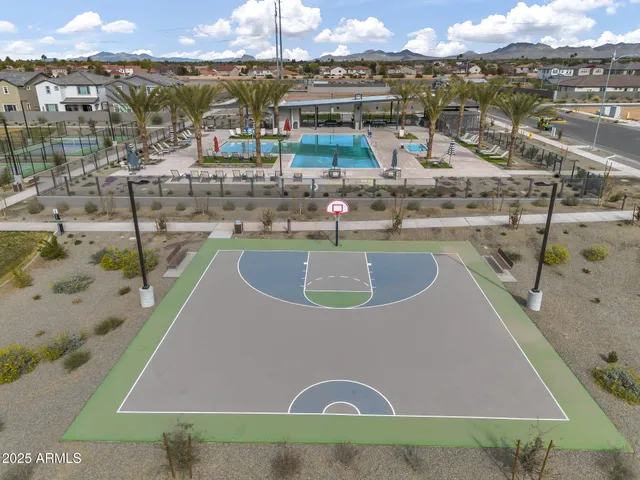 a view of a swimming pool with a lake view