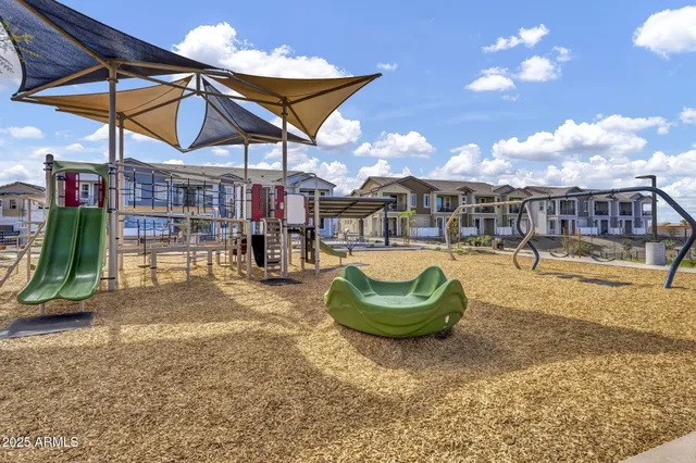 a view of a chairs and tables in the patio