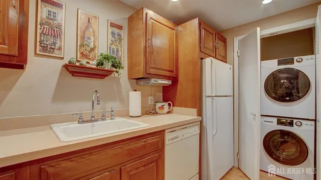 a bathroom with a sink a mirror and cabinets