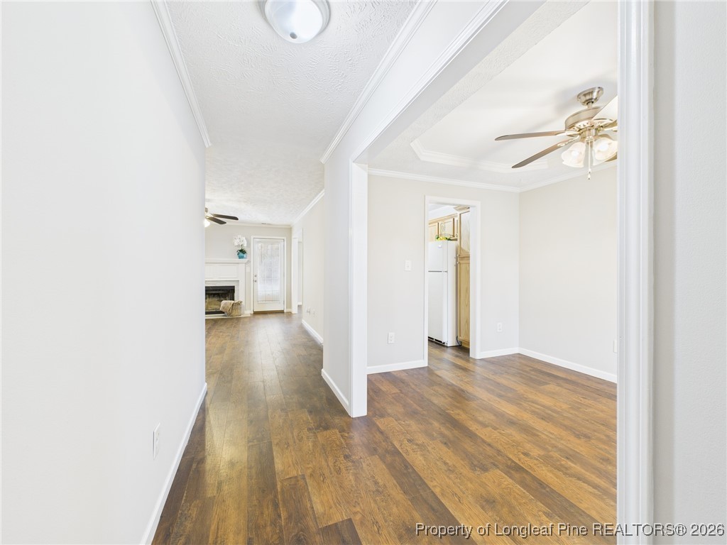 4403 Bishamon Street Hope Mills, NC 28348 - Photo 3 of 41 a view of a hallway with wooden floor
