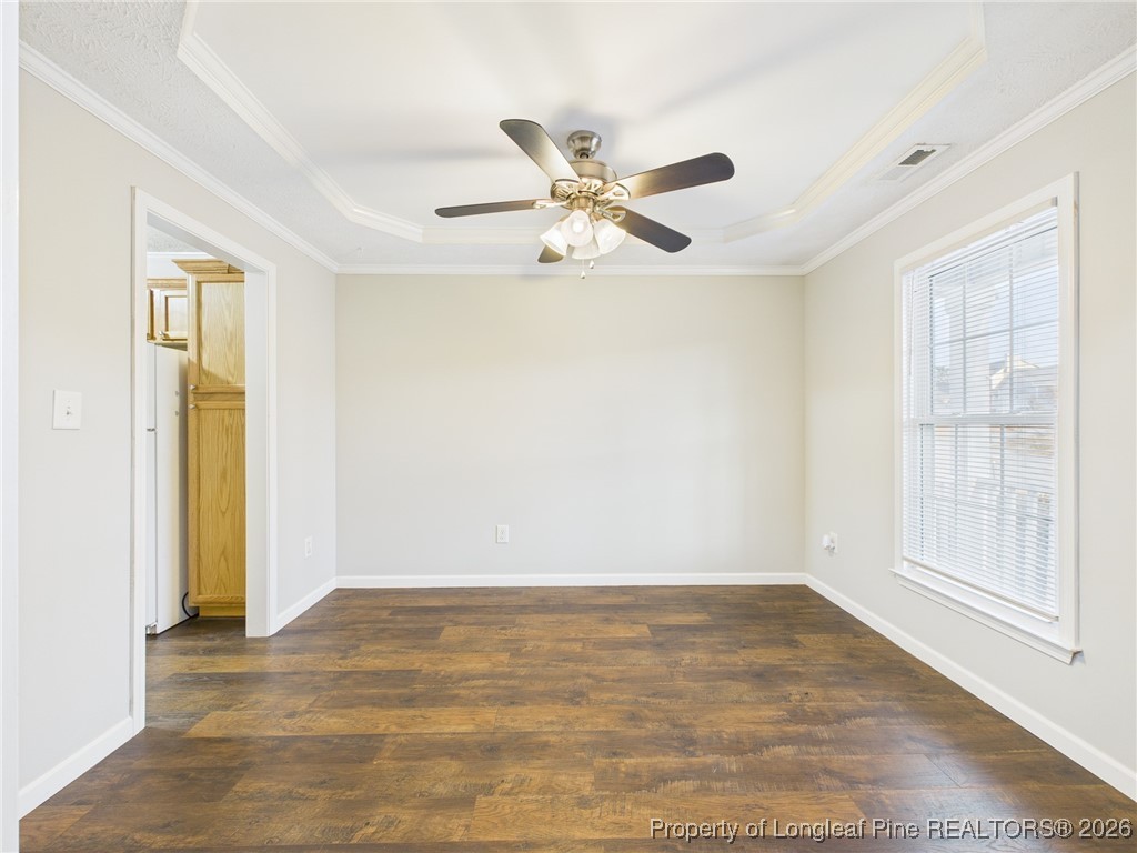 4403 Bishamon Street Hope Mills, NC 28348 - Photo 6 of 41 a view of an empty room with window and a ceiling fan