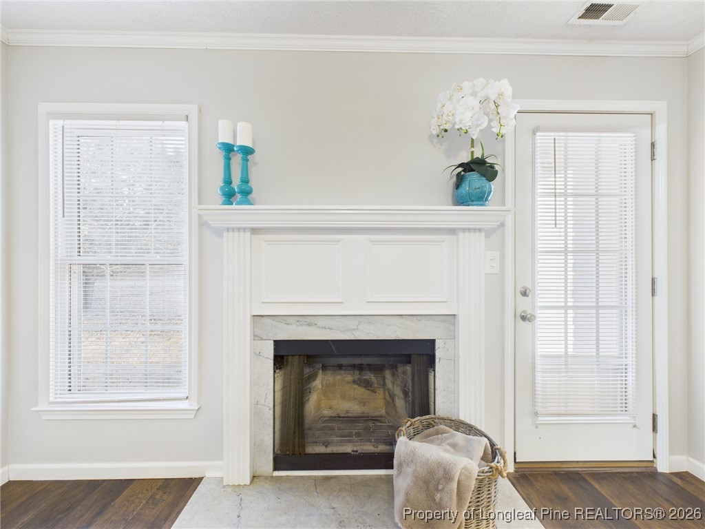 4403 Bishamon Street Hope Mills, NC 28348 - Photo 7 of 41 a living room with furniture and a fireplace