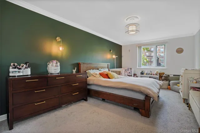 a bed room with a bed and a dresser