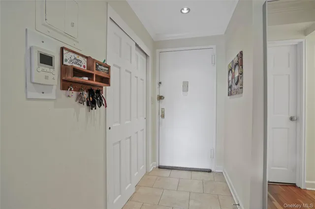 a view of a hallway with closet
