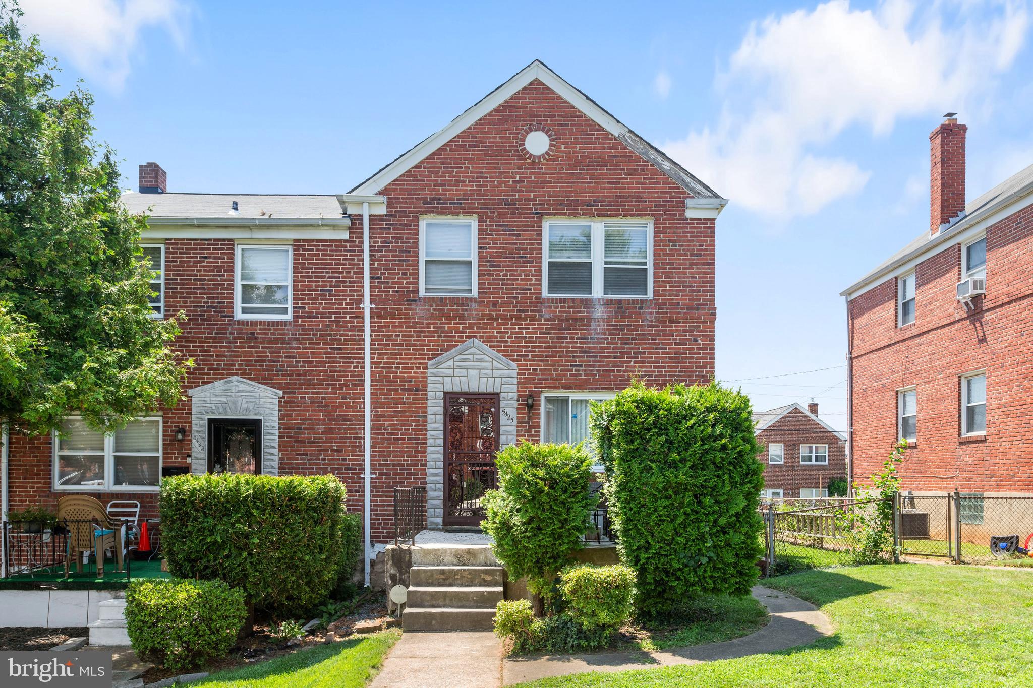 5425 Whitlock Road Baltimore, MD 21229 - Photo 1 of 30 a front view of a house with a yard