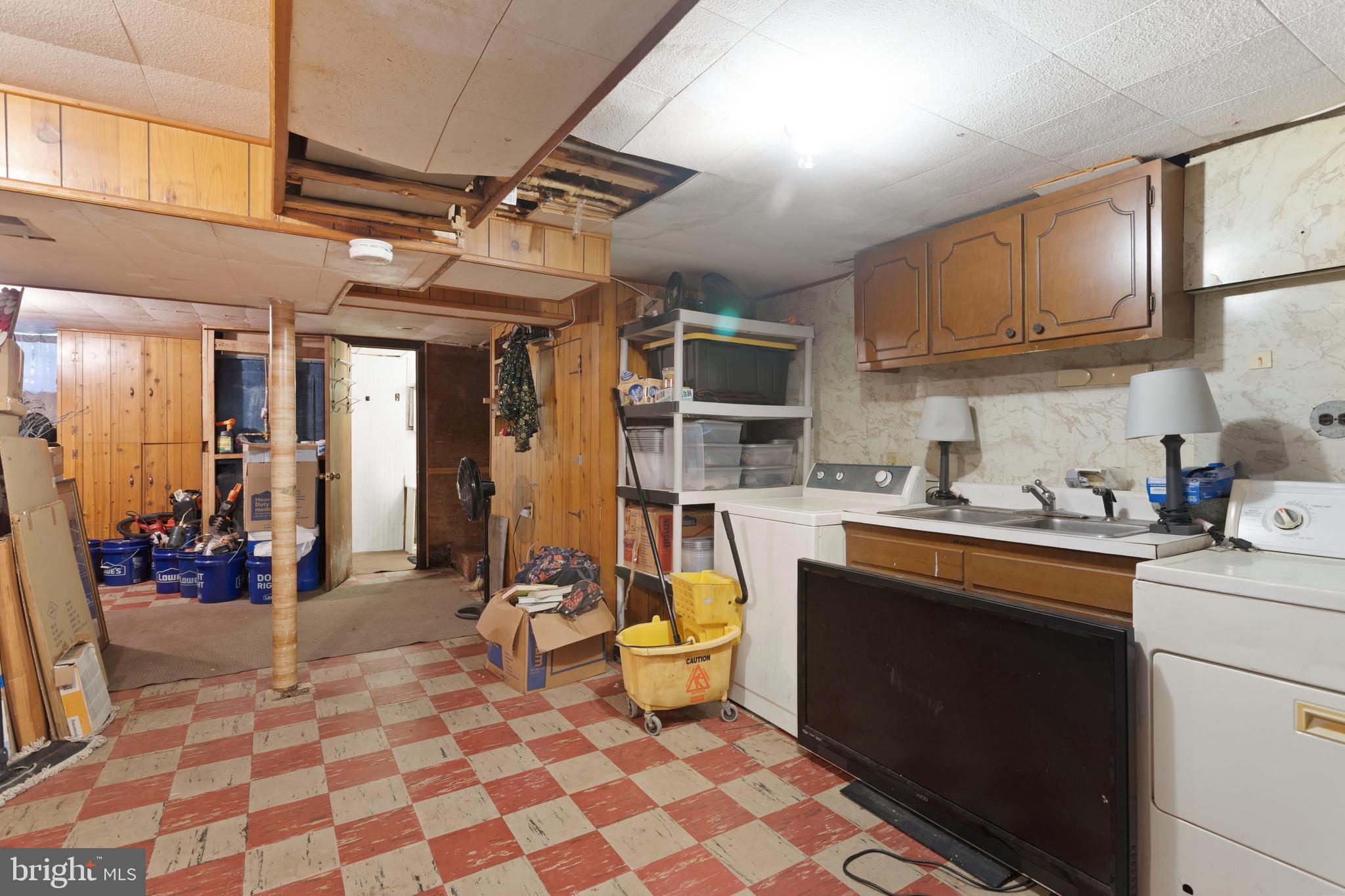 5425 Whitlock Road Baltimore, MD 21229 - Photo 13 of 30 a kitchen with a sink and appliances