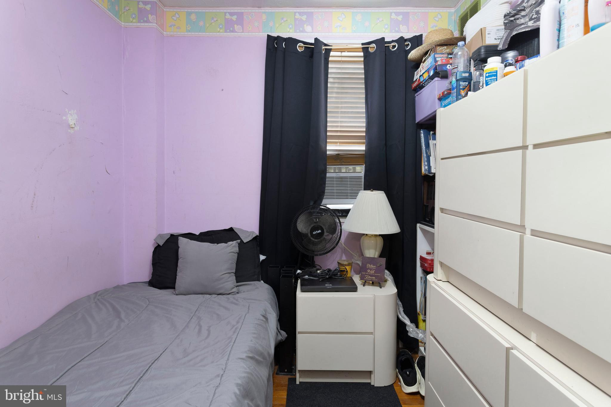 5425 Whitlock Road Baltimore, MD 21229 - Photo 25 of 30 a bedroom with a bed and a cabinets
