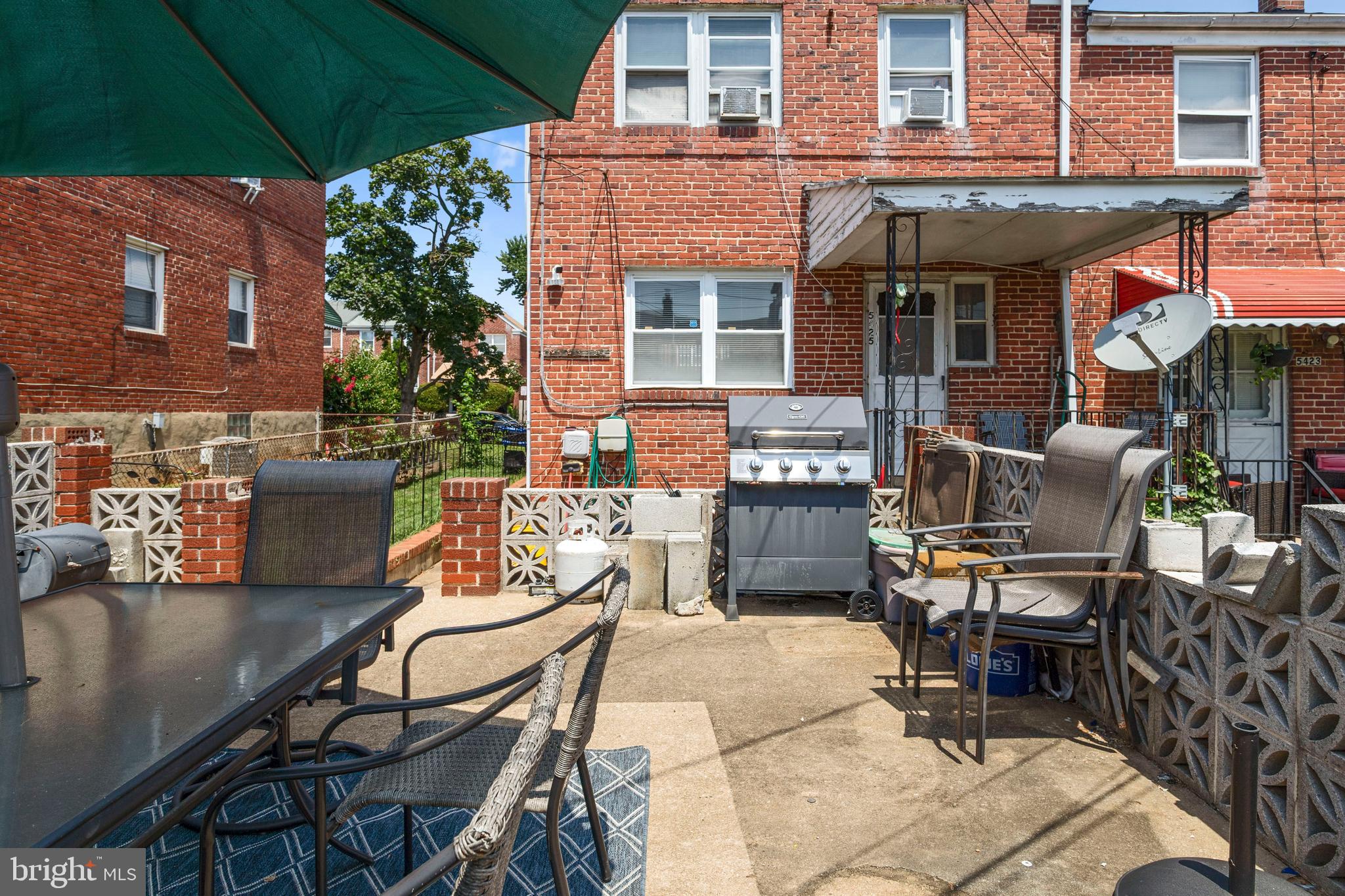 5425 Whitlock Road Baltimore, MD 21229 - Photo 29 of 30 a backyard of a house with seating space