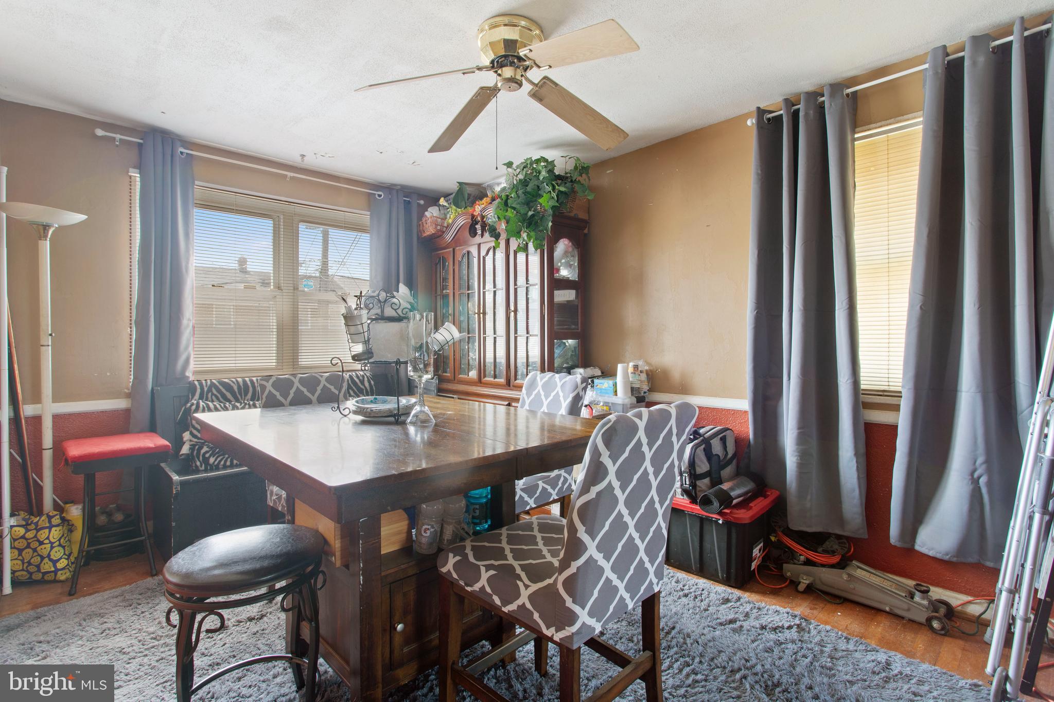 5425 Whitlock Road Baltimore, MD 21229 - Photo 8 of 30 a view of a dining room with furniture and a chandelier