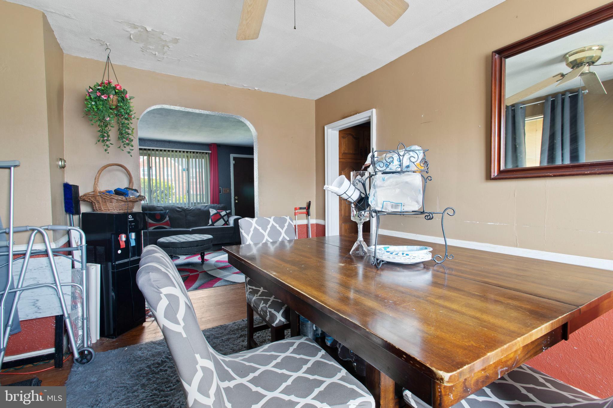 5425 Whitlock Road Baltimore, MD 21229 - Photo 9 of 30 a dining room with furniture and wooden floor